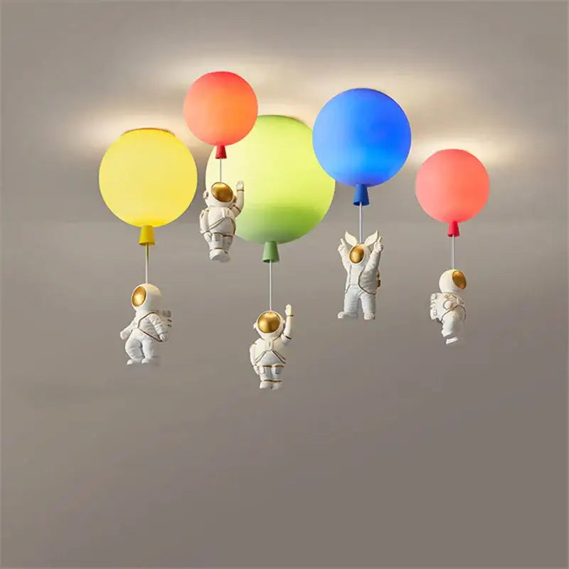 Colorful balloon-themed pendant light with astronaut figurines designed for children featuring decorbites astronaut balloon led
