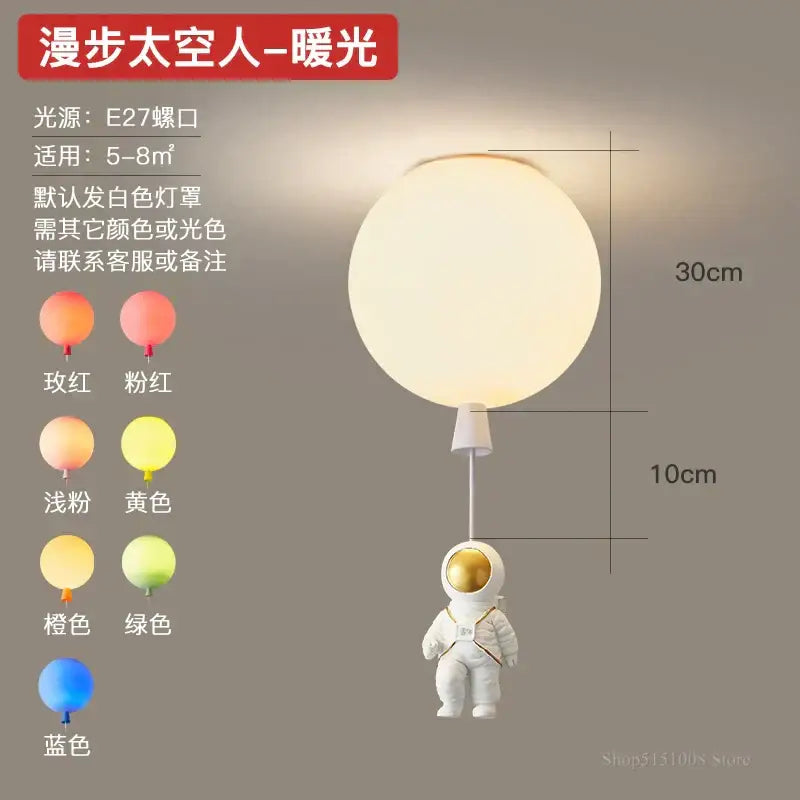 DecorBites astronaut balloon led pendant light features a white astronaut figurine with gold accents on frosted glass