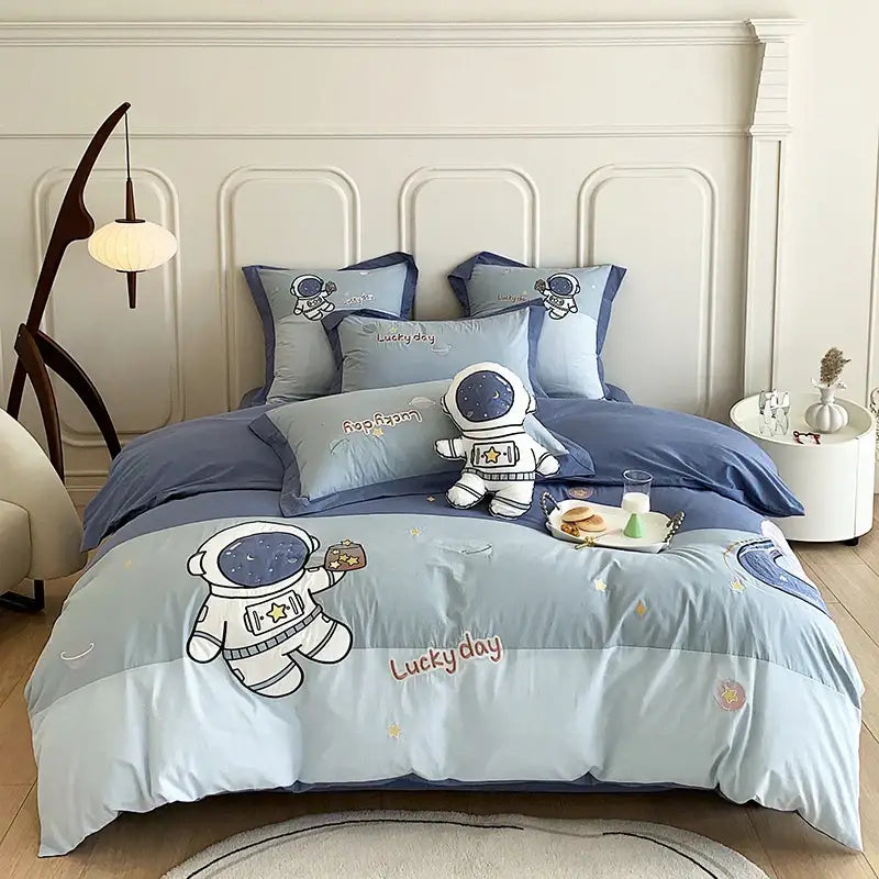 Light blue DecorBites astronaut cartoon bedding set with embroidered stars lucky day design 100% cotton quilted fabric