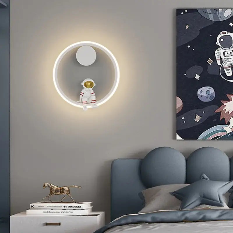 DecorBites astronaut cartoon circular led wall lamp with glowing white ring and seated miniature astronaut figurine