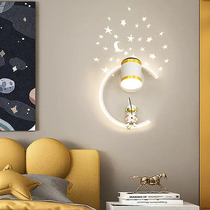 Decorbites astronaut cartoon wall lamp featuring a white and gold crescent moon with a glowing astronaut figure