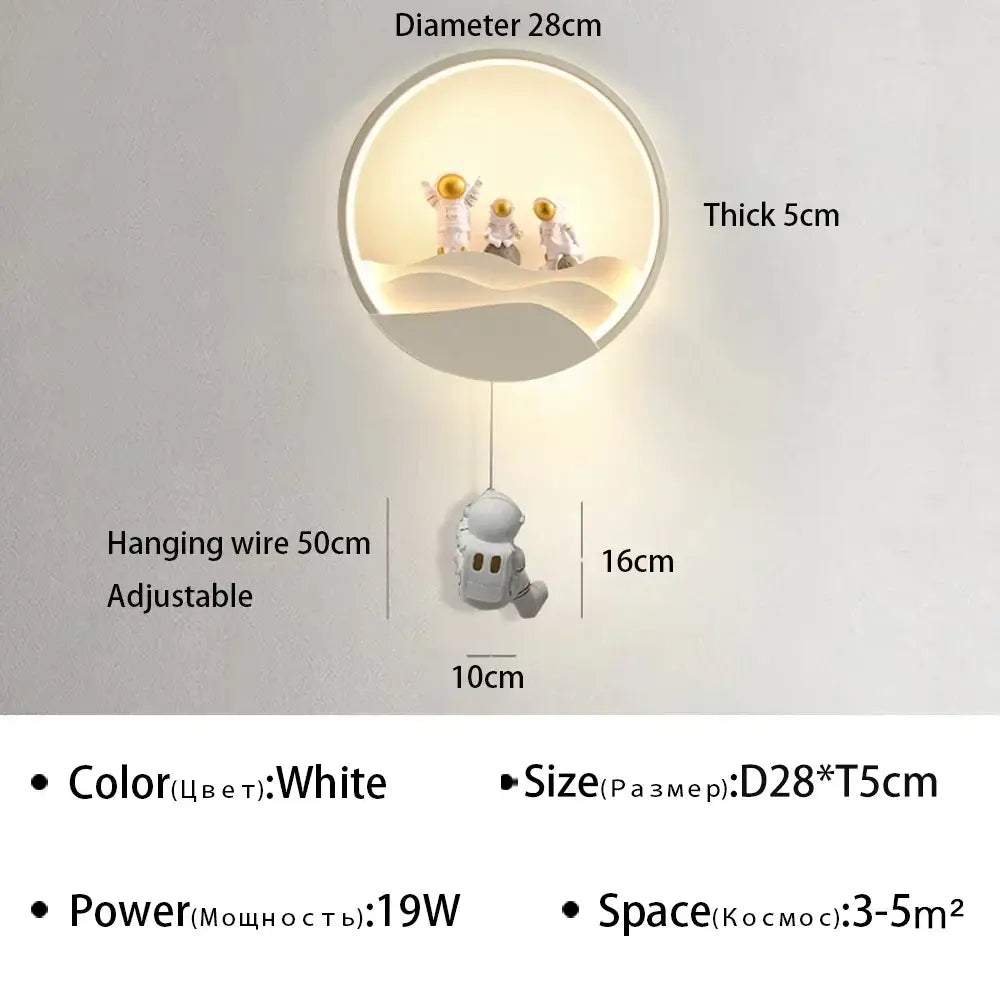 White circular wall lamp featuring decorbites astronaut cartoon figurines with adjustable hanging wire for modern home decor