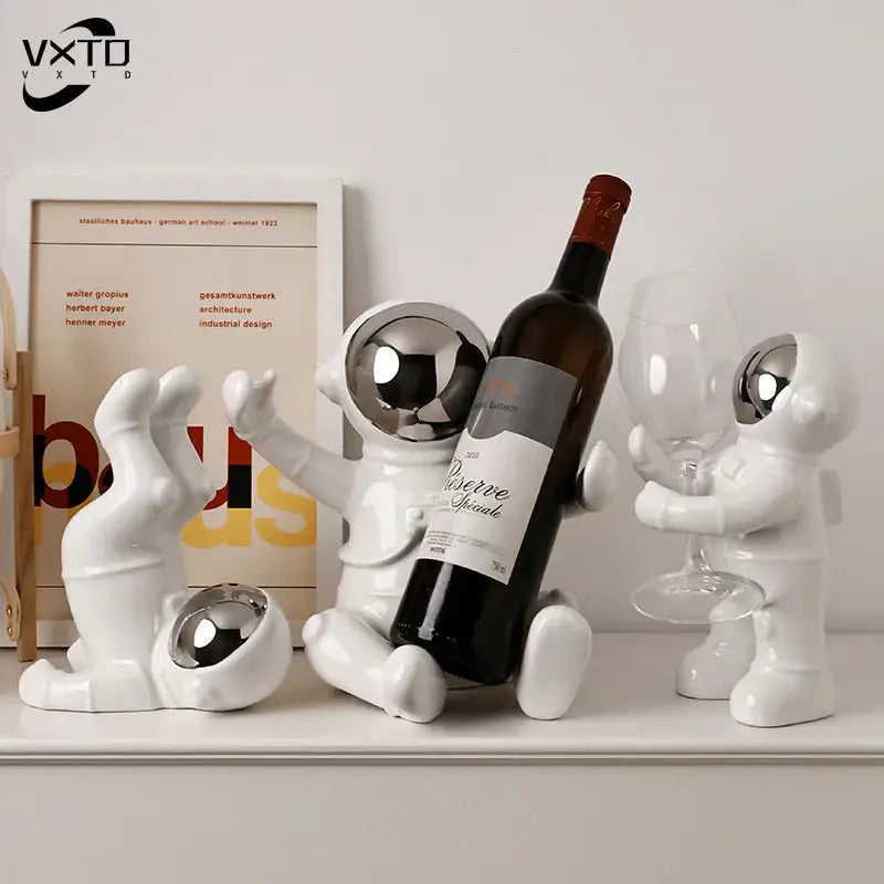 White ceramic astronaut ceramic wine rack figurines with reflective silver helmets designed as wine bottle and glass holder