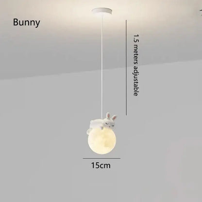 White bunny-shaped pendant light with glowing moon base suspended by adjustable cord in decorbites astronaut chandelier