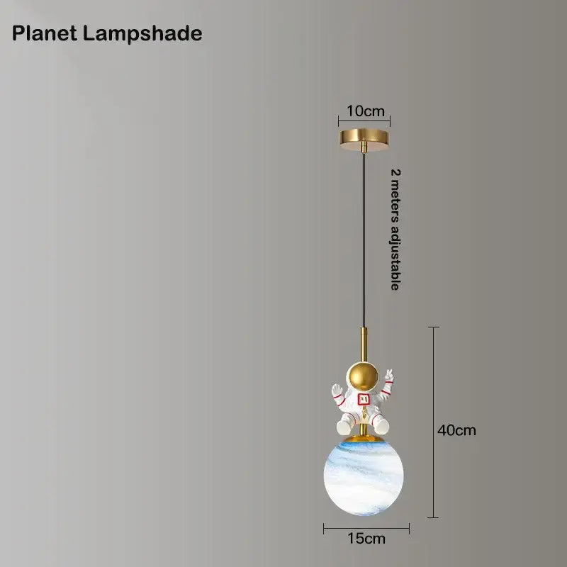 A whimsical gold-toned decorbites astronaut chandelier with a marbled blue and white spherical lampshade for children’s rooms