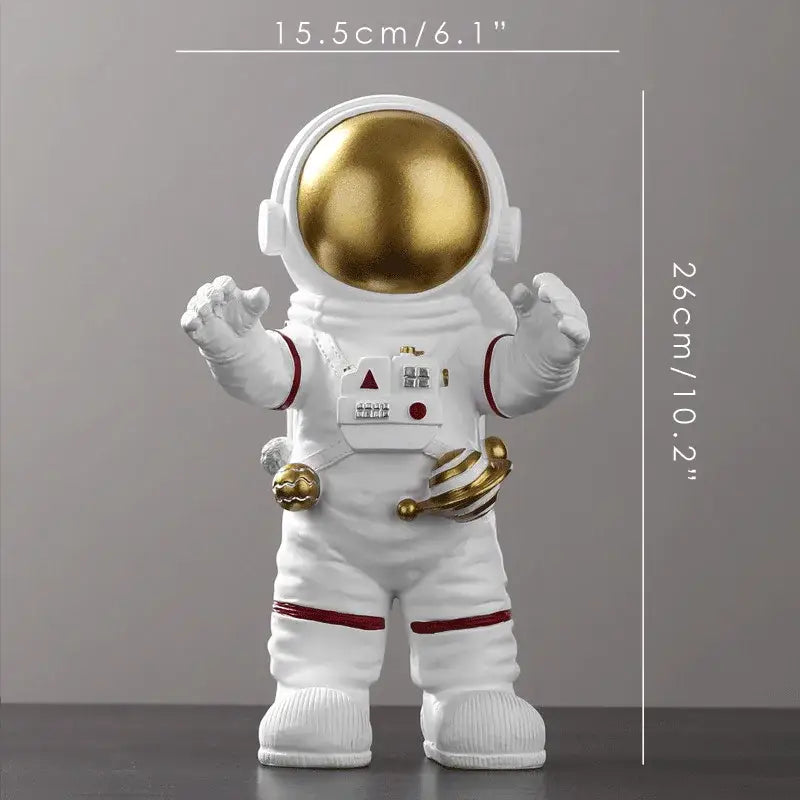 Decorbites astronaut figurine abstract sculpture features a white suit with gold helmet and red accents for modern decor