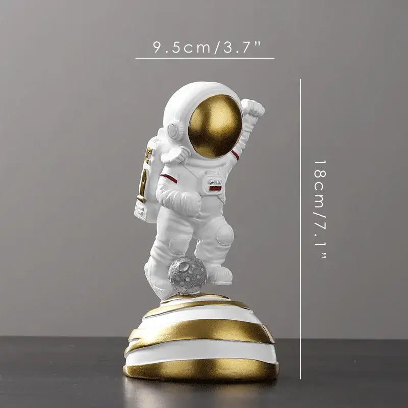Decorbites astronaut figurine abstract sculpture in white with gold helmet and striped gold white base for modern decor