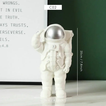 Decorbites astronaut figurine abstract sculpture in white with shiny silver helmet standing in saluting pose for modern decor