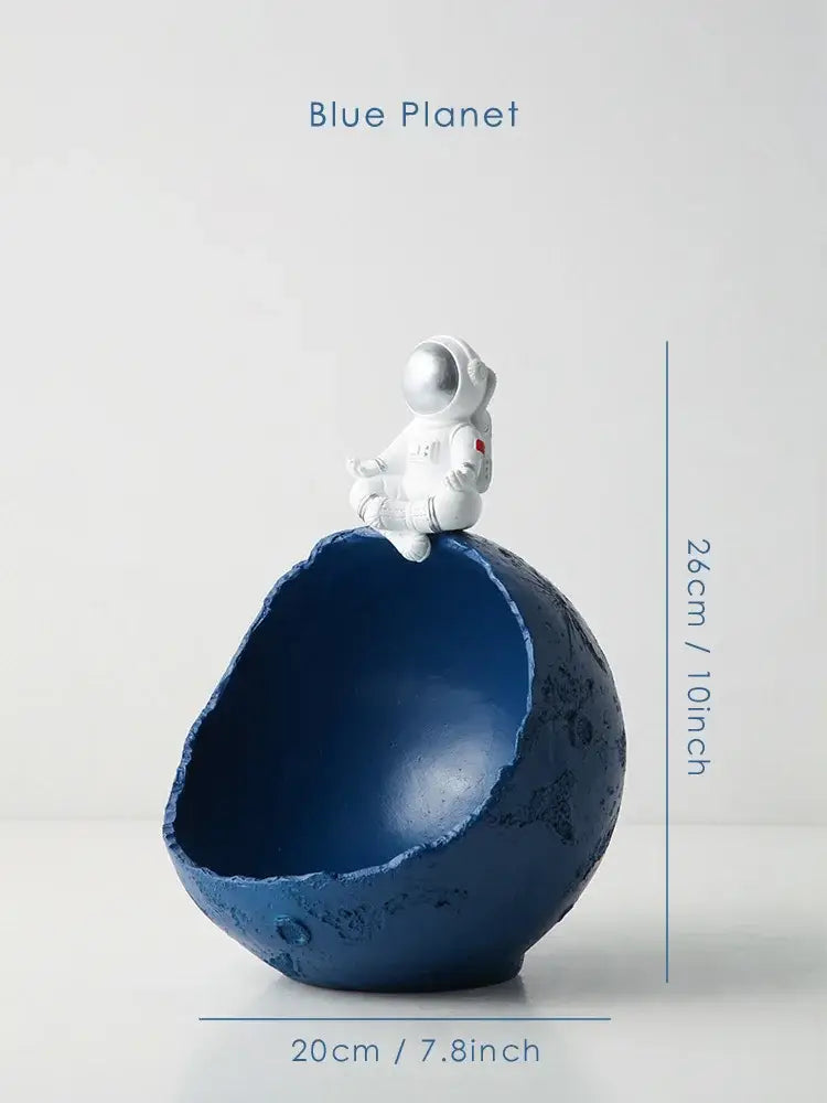 Decorbites astronaut figurine abstract sculpture white astronaut sitting atop deep blue planet bowl for modern decor
