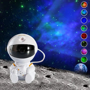 White decorbites astronaut galaxy starry sky night light with yellow accents projects colorful galaxy patterns for bedroom