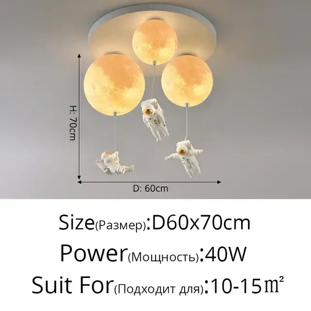 Modern ceiling light with three glowing orange moons and two white astronaut figurines by decorbites astronaut globe