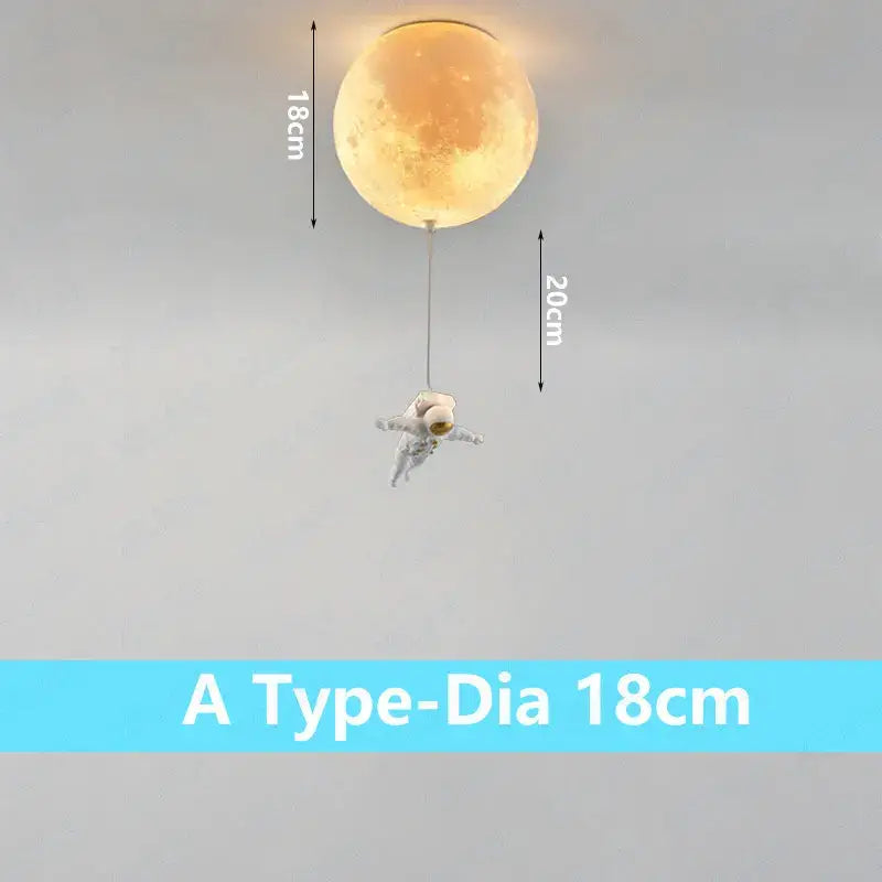 A warm glowing spherical decorbites astronaut globe ceiling light with a dangling astronaut figure for kids room