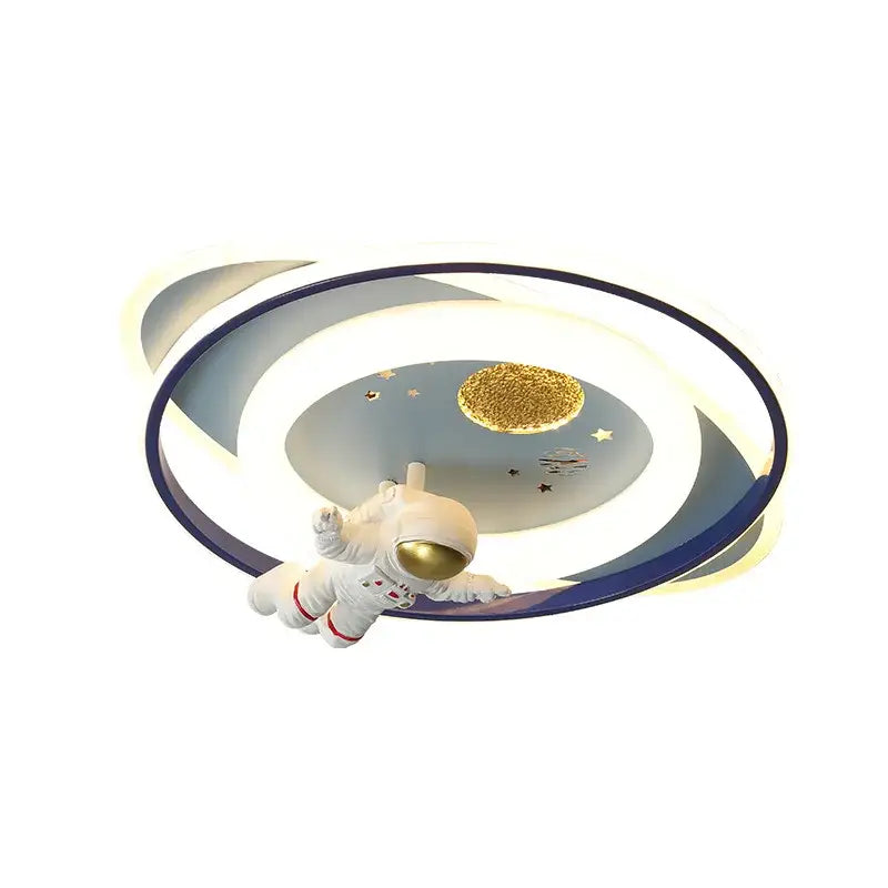 A white and gold decorbites astronaut kids bedroom ceiling light features a textured golden planet and star design