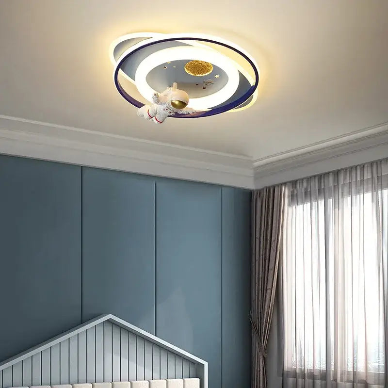 Decorbites astronaut kids ceiling light with glowing golden planet and astronaut figurine for astronaut kids bedroom decor