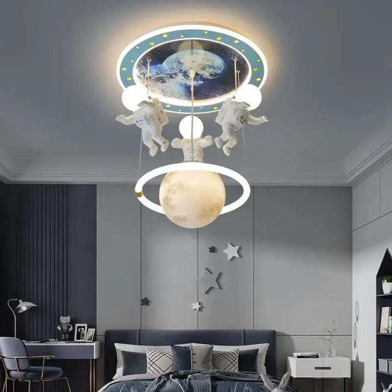 Decorbites astronaut led ceiling light features a circular earth and starry sky design with suspended white astronaut figures and a glowing moon ring