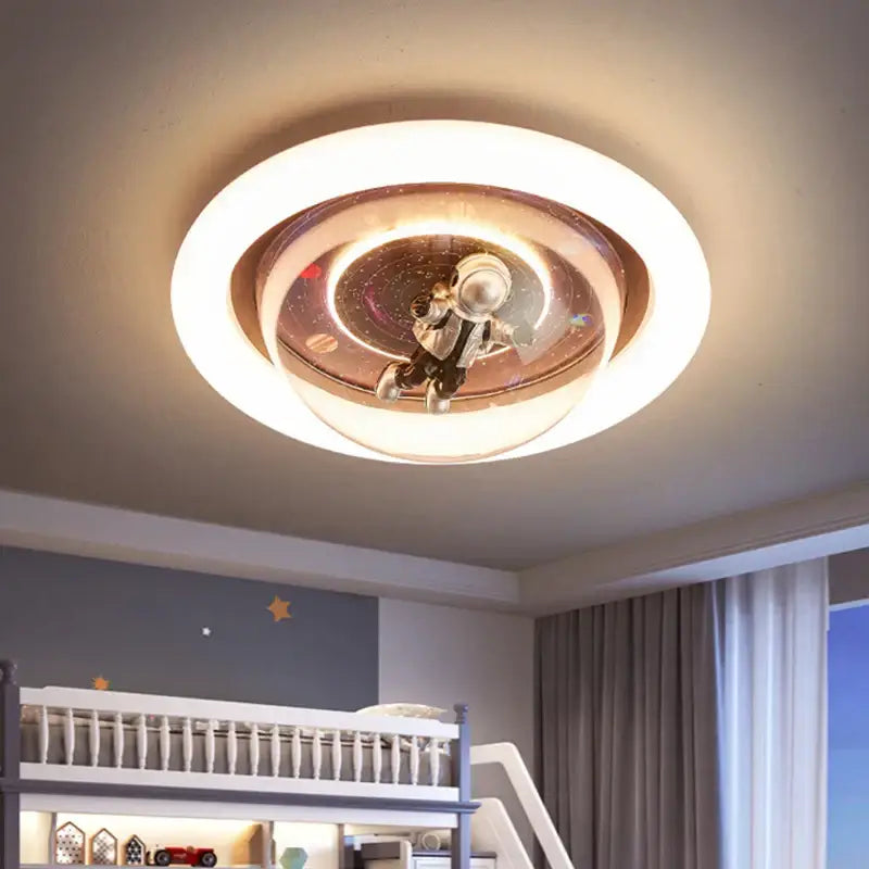 Circular decorbites astronaut led ceiling light with glowing white ring and translucent dome featuring floating astronaut figure