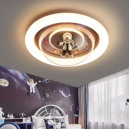 Circular decorbites astronaut led ceiling light with translucent multi-layered design featuring floating astronaut and planets