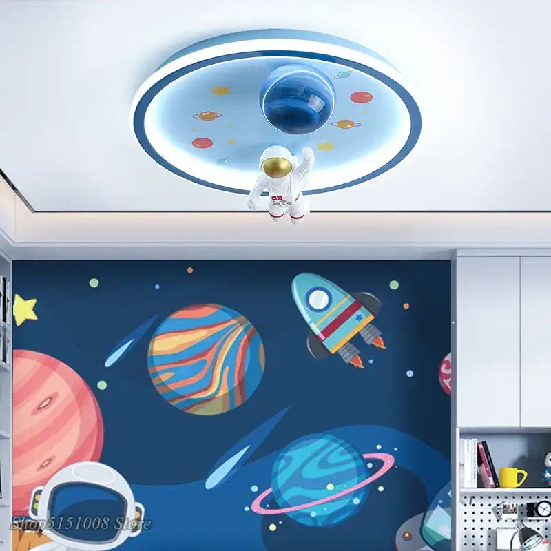 Blue circular ceiling lights with central planet and astronaut figurine by decorbites astronaut led for kids room decor