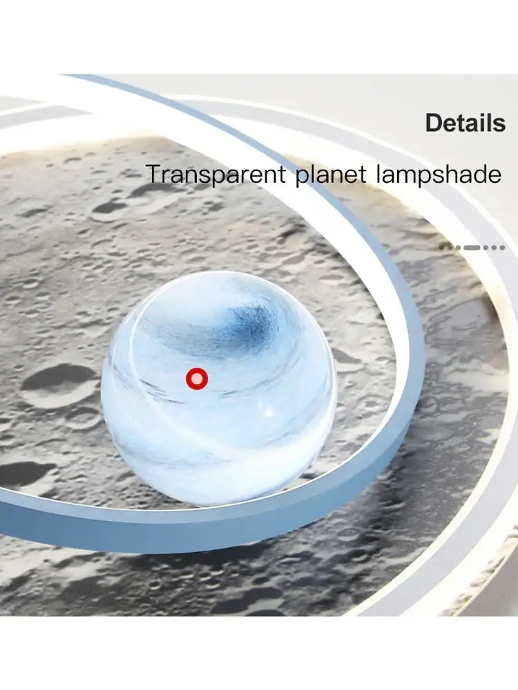 Transparent spherical decorbites astronaut led chandelier with blue gradient and red dot against lunar surface backdrop