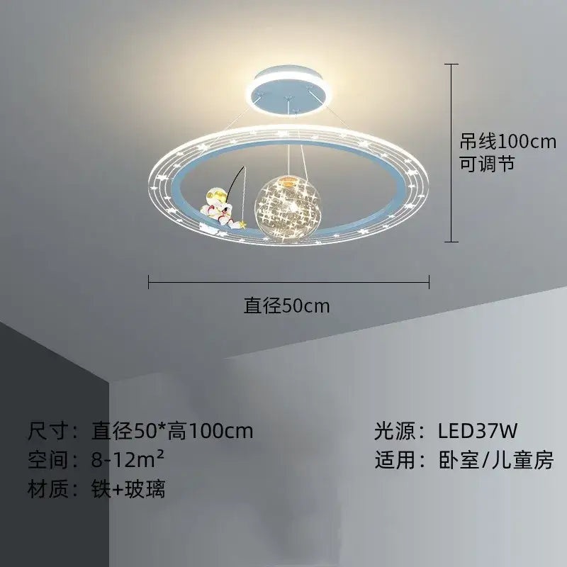 A decorbites astronaut led chandelier with a blue and white metallic frame and central glass globe for children’s rooms