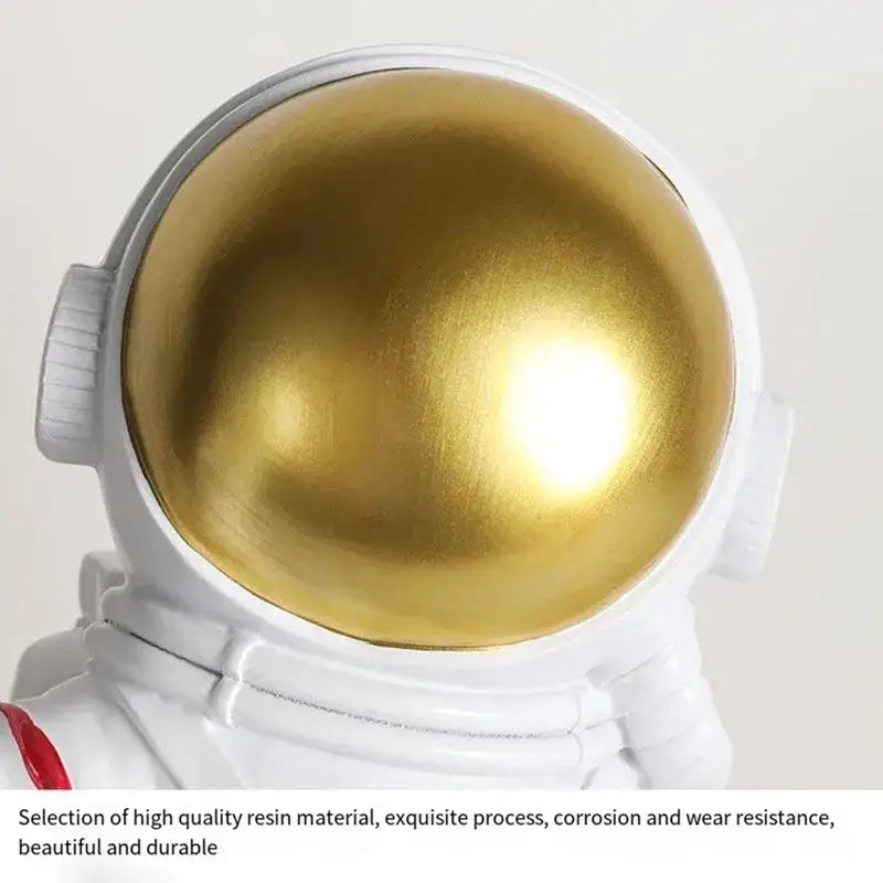 White astronaut helmet desk lamp with shiny gold visor made of high-quality resin decorbites astronaut led desk light