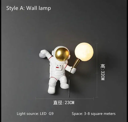 Decorbites astronaut led table lamp in white resin with gold helmet holding glowing spherical light for kids room decor