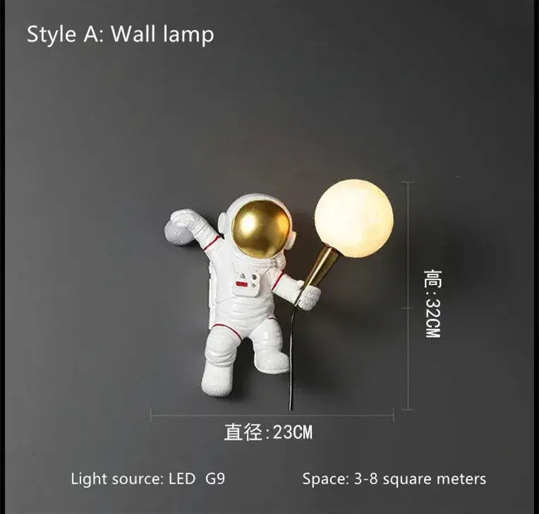 Decorbites astronaut led table lamp in white resin with gold helmet holding glowing spherical light for kids room decor