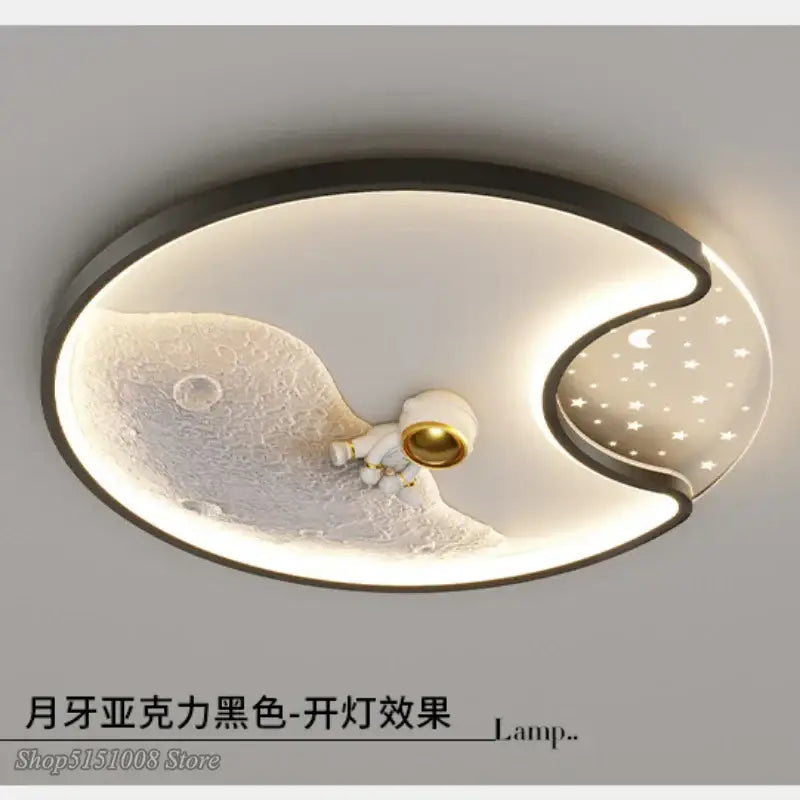 Modern black framed decorbites astronaut moon acrylic ceiling lamp featuring oval moon surface and white astronaut figurine