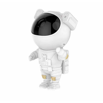 White astronaut figurine with black visor and gold accents in decorbites astronaut projector starry night bedroom lamp night light