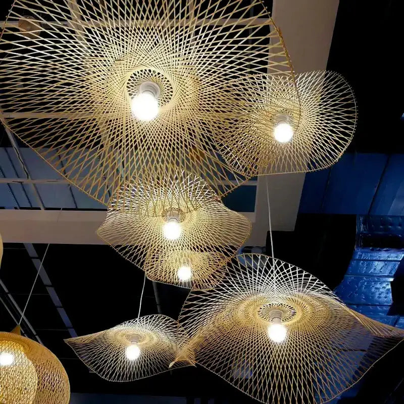 Elegant golden bamboo chandelier with intricate woven design and glowing bulbs by decorbites bamboo chandelier