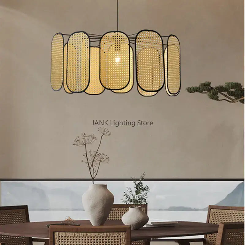 Beige woven bamboo core rattan chandelier with black metal frame and oval panels for kitchen pendant light by decorbites