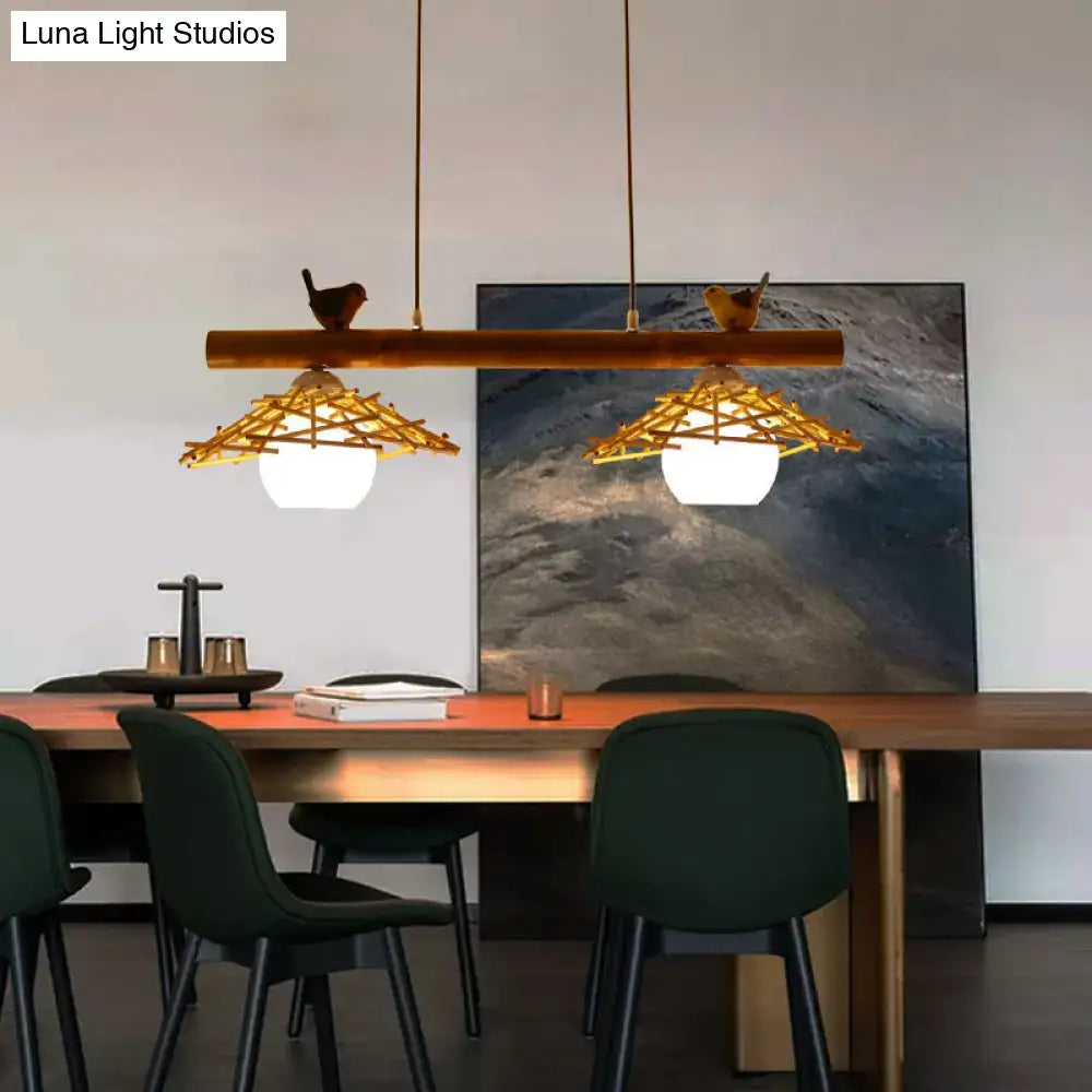DecorBites™ bamboo pendant lighting with warm-toned woven rattan shades, white glass, art deco bird figurines on top