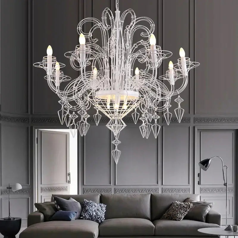 An ornate white decorbites baroque iron designer led chandelier with intricate wireframe and crystal accents for foyers