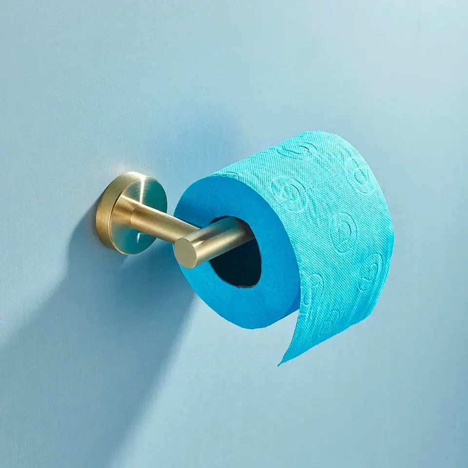 Decorbites bathroom hardware set featuring a vibrant turquoise toilet paper roll on a sleek brass tissue holder
