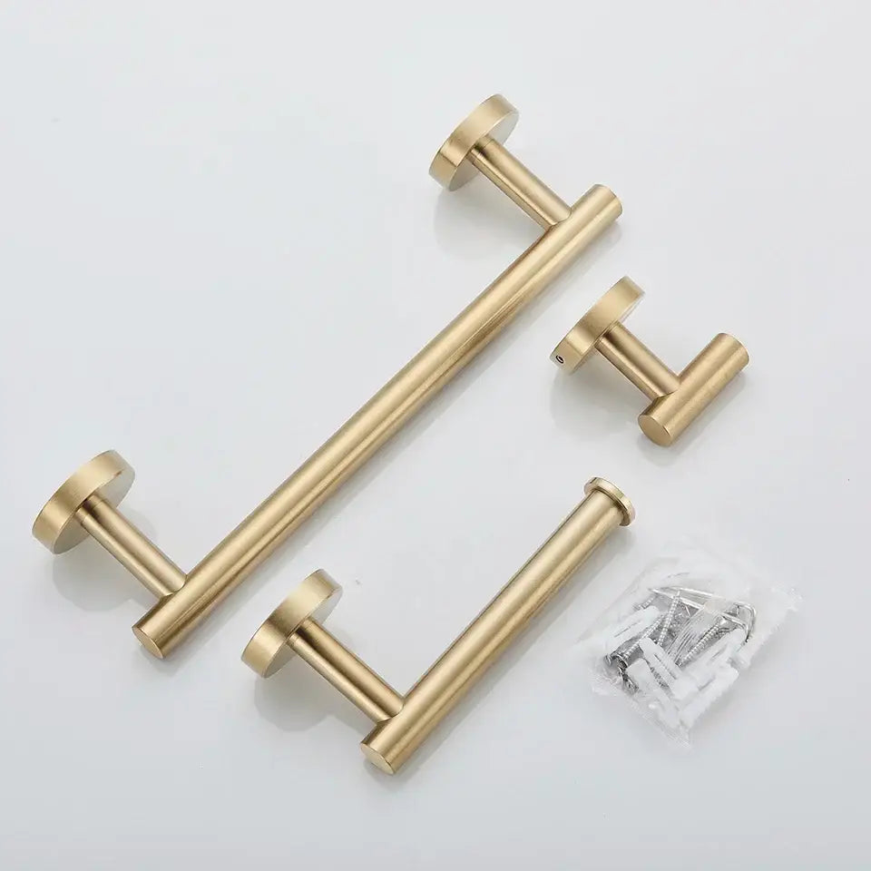 Gold-finished metal towel rack with modern design and matching hardware in DecorBites bathroom hardware set