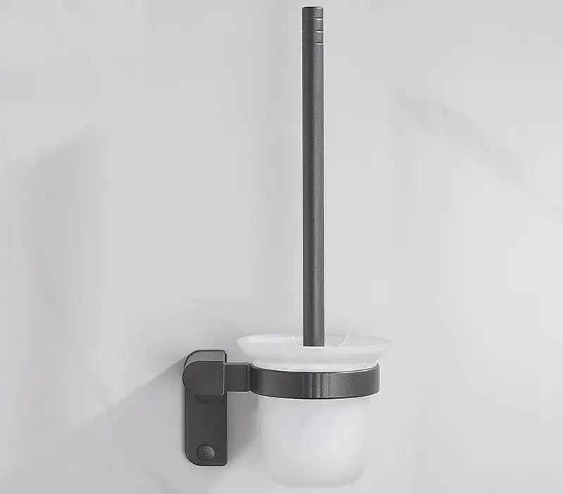 Modern matte black toilet brush holder with frosted white glass base and handle from decorbites bathroom hardware set
