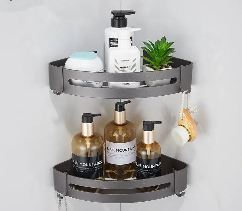 Gray two-tiered corner shower caddy with integrated hooks in decorbites bathroom hardware set for organized storage