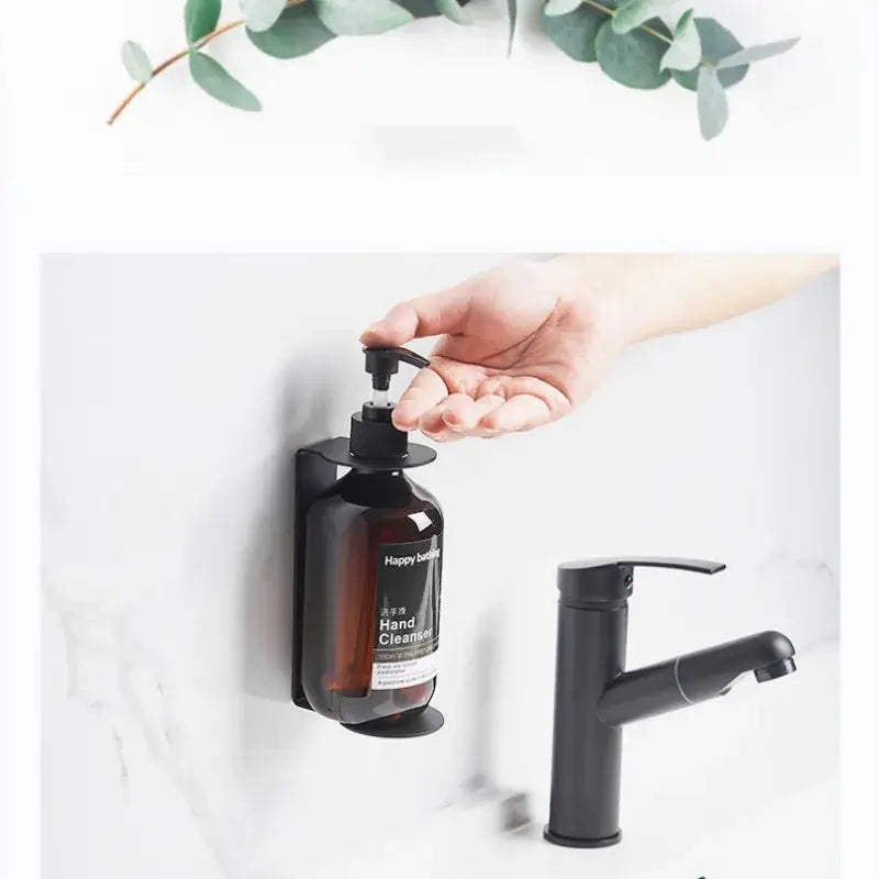 Black decorbites™ wall-mounted liquid soap dispenser with matte finish made of SUS 304 and ABS materials, 500ml capacity