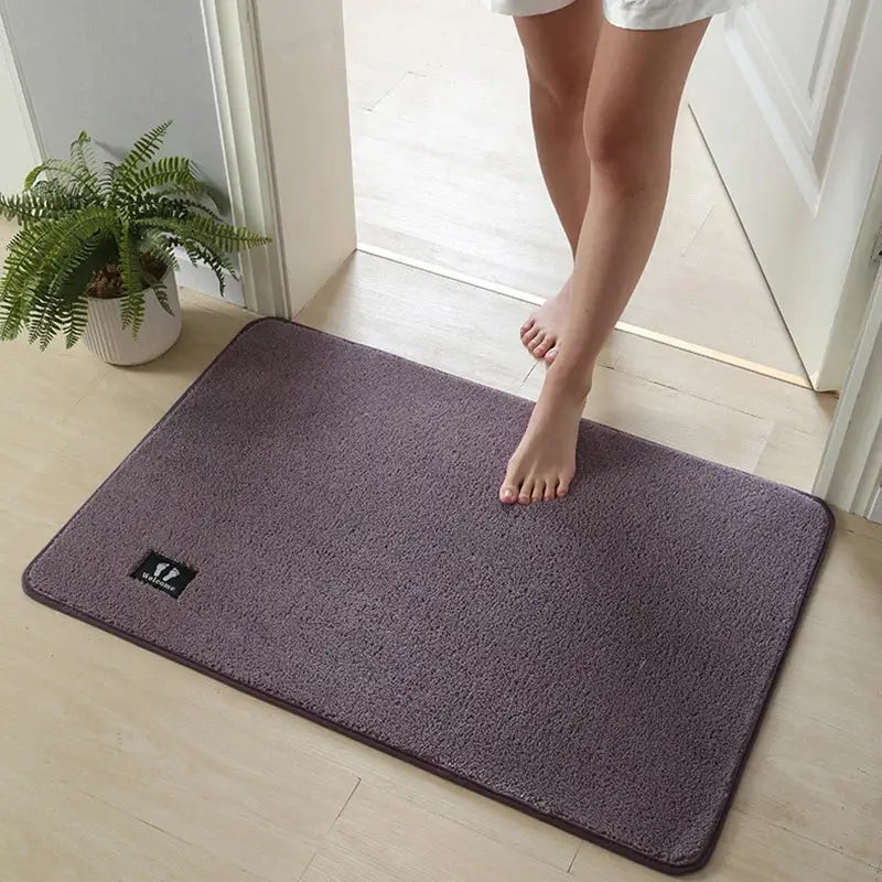Purple decorbites bathroom mat with plush textured surface and dark border, super non-slip and quick drying rug