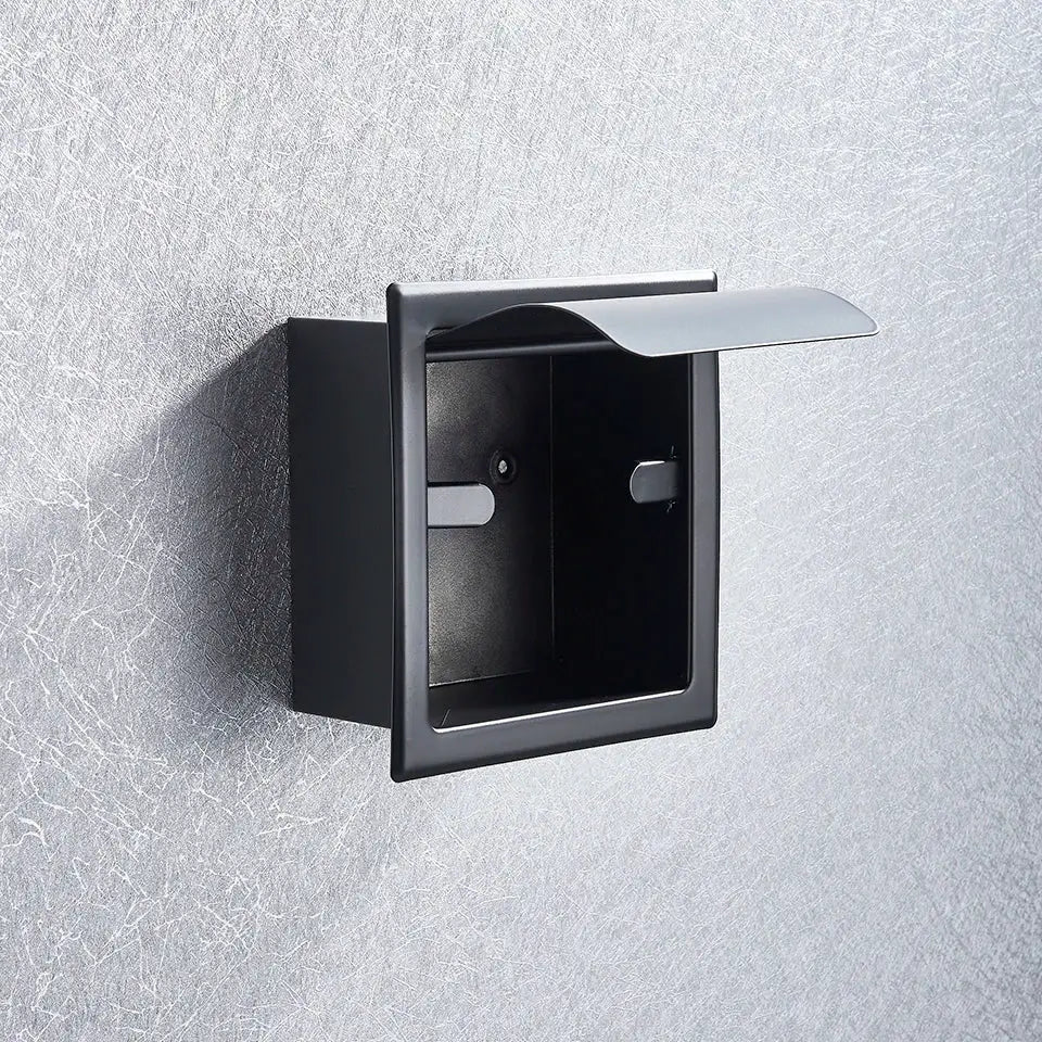 Decorbites™ matte black wall-mounted paper holder with a sleek silver hinged lid and modern roll paper box design