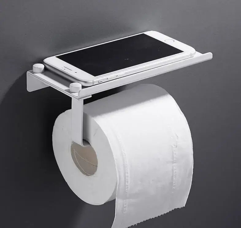 White metal DecorBites bathroom paper phone holder with minimalist design and integrated smartphone shelf in silver gold