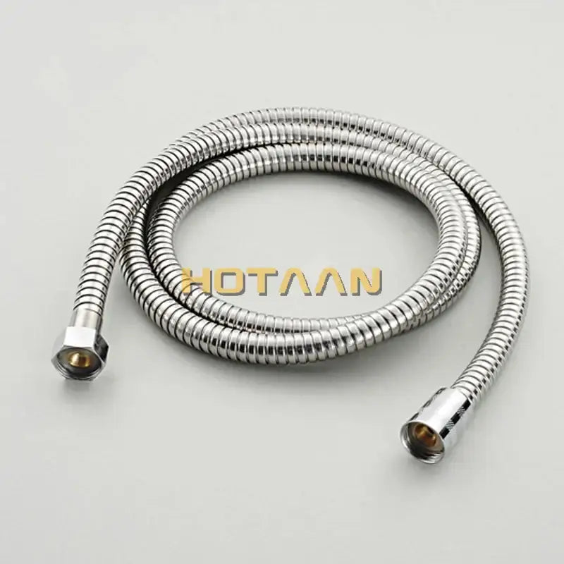 Decorbites shower faucet set features a coiled metallic silver flexible hose with ribbed texture for wall mounted use