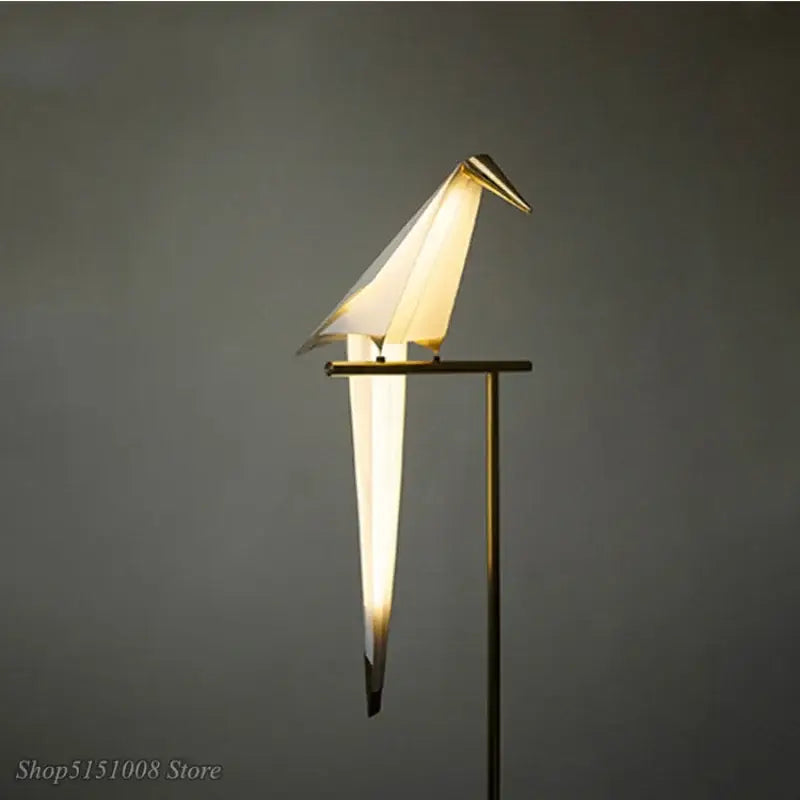 Decorbites bird origami floor lamp with warm glowing light and metallic gold accents for living room decor