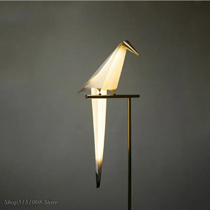 Decorbites bird origami floor lamp with warm glowing light and metallic gold accents for living room decor