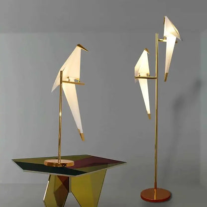 Gold-toned decorbites bird origami floor lamp with illuminated white paper wings for living room lighting