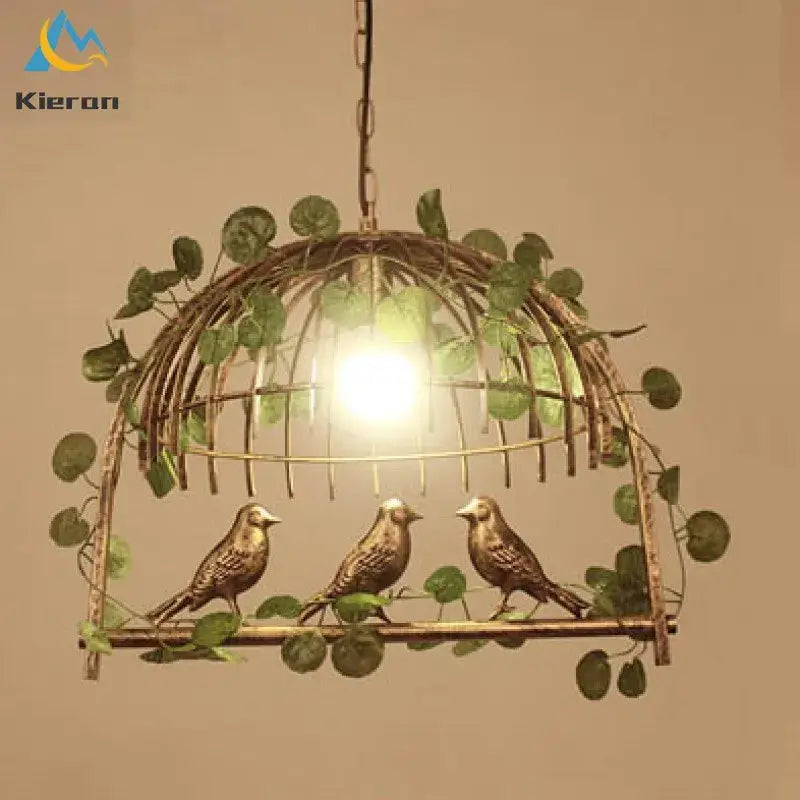 Antique brass Decorbites birdcage led chandelier with green vines and three detailed birds for black and white bedroom light