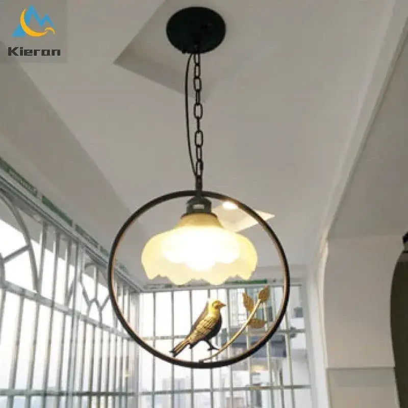Black metal decorbites birdcage led chandelier with golden bird and frosted glass shade for black and white bedroom light