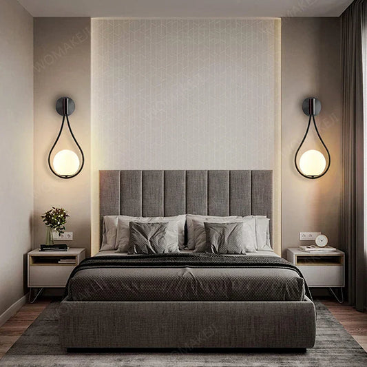 Gray upholstered bed shown alongside decorbites™ black battery operated wall sconces with remote and usb type-c charging