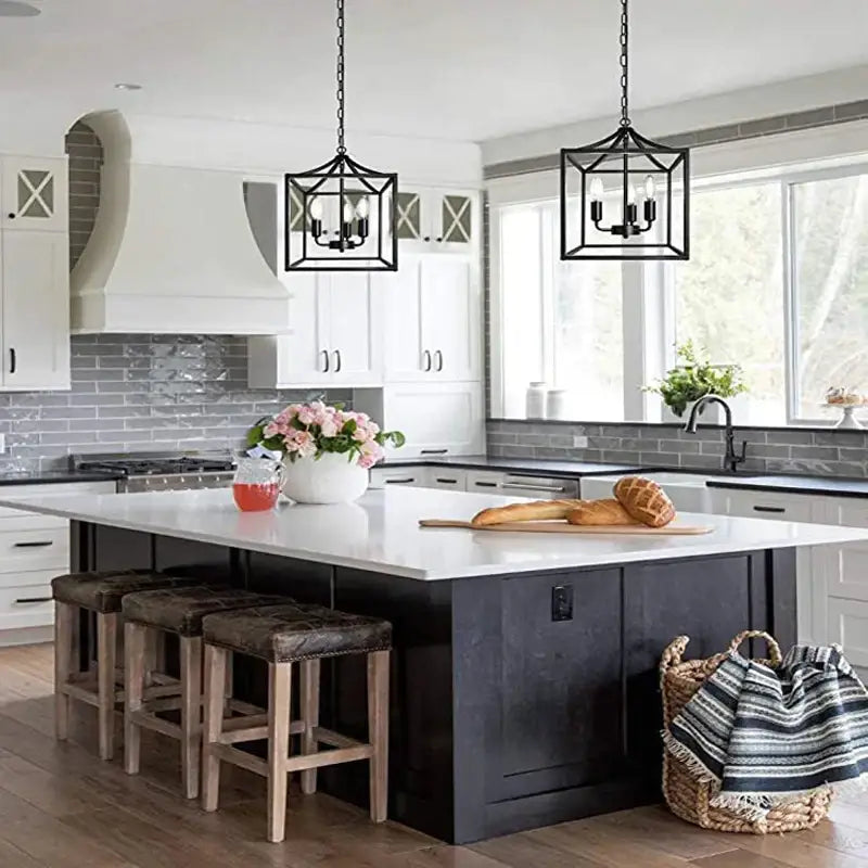 Decorbites black farmhouse chandelier features black metal cage pendant lights with multiple bulbs hanging from chains