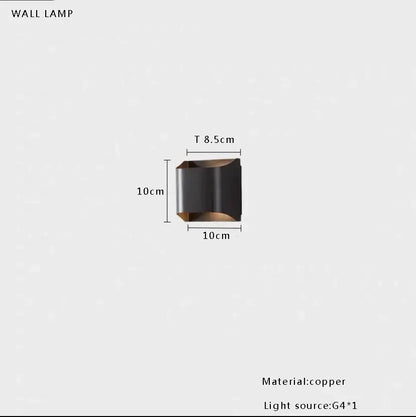 Copper wall lamp with sleek angular design and matte black finish paired with decorbites black glass ball floor lamp